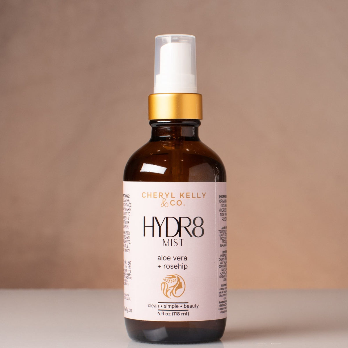 Aloe Vera + Rosehip: Cheryl Kelly & Co. HYDR8 Aloe Vera + Rosehip facial mist in a 4 oz amber spray bottle.