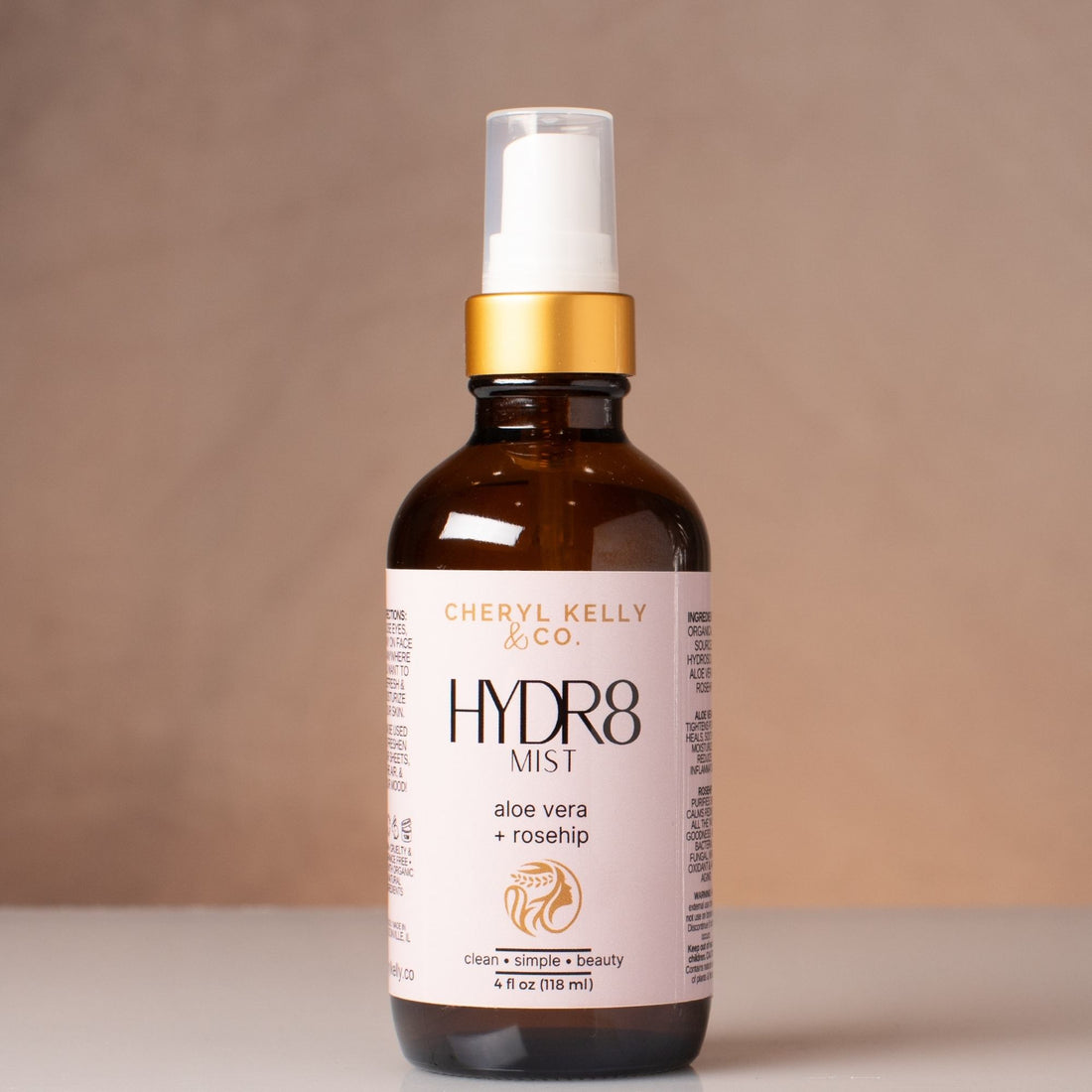 Aloe Vera + Rosehip: Cheryl Kelly &amp; Co. HYDR8 Aloe Vera + Rosehip facial mist in a 4 oz amber spray bottle.