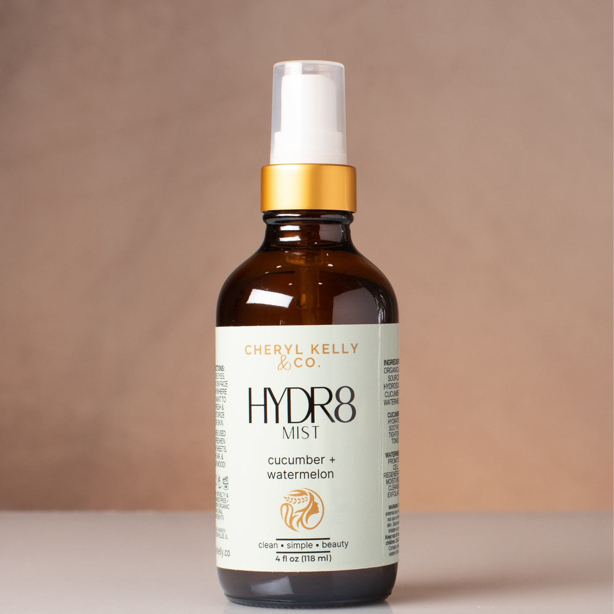 Cucumber + Watermelon: Cheryl Kelly &amp; Co. HYDR8 Cucumber + Watermelon facial mist in a 4 oz amber spray bottle.